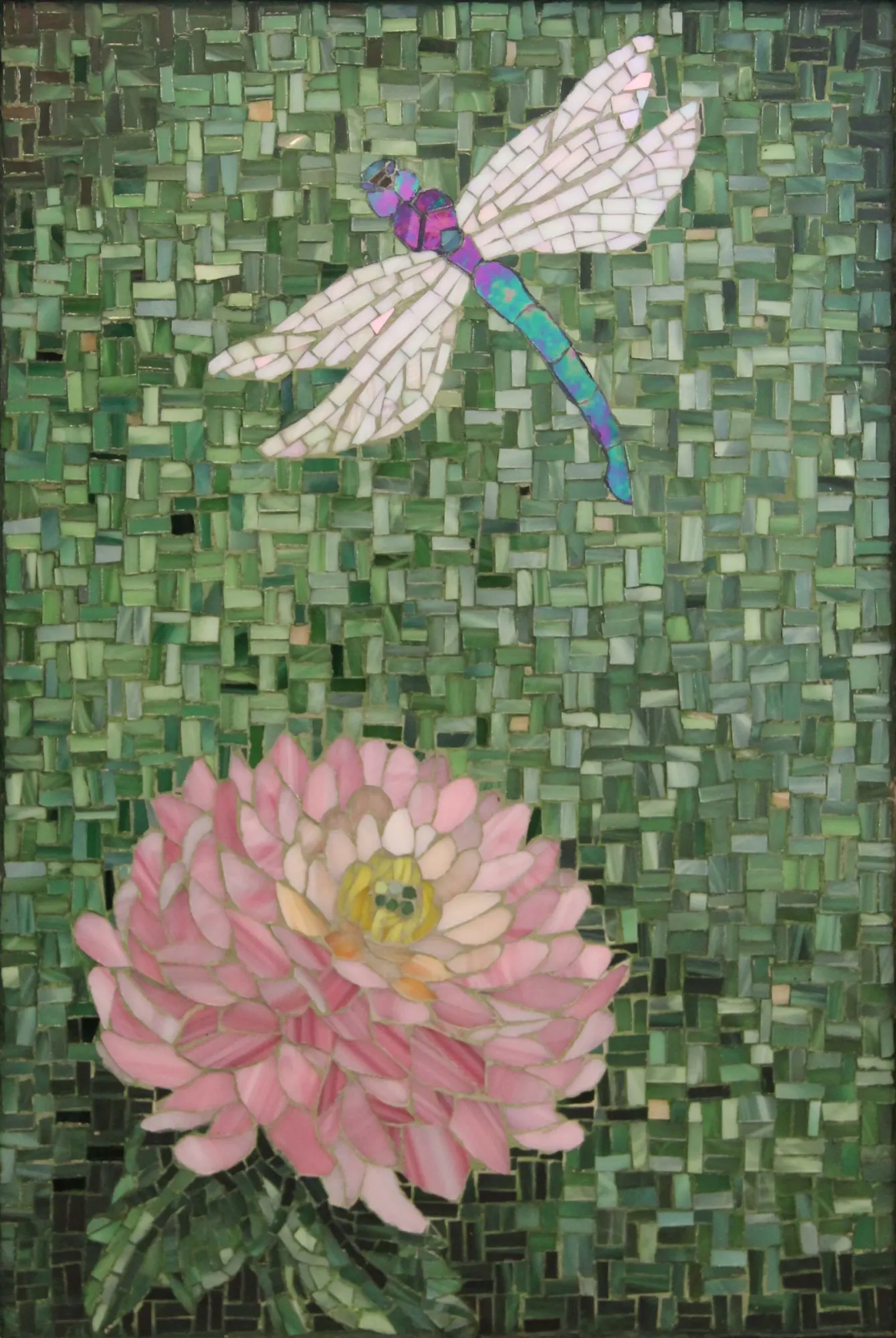 Mosaic of a dragonfly hovering above a chrysanthemum flower