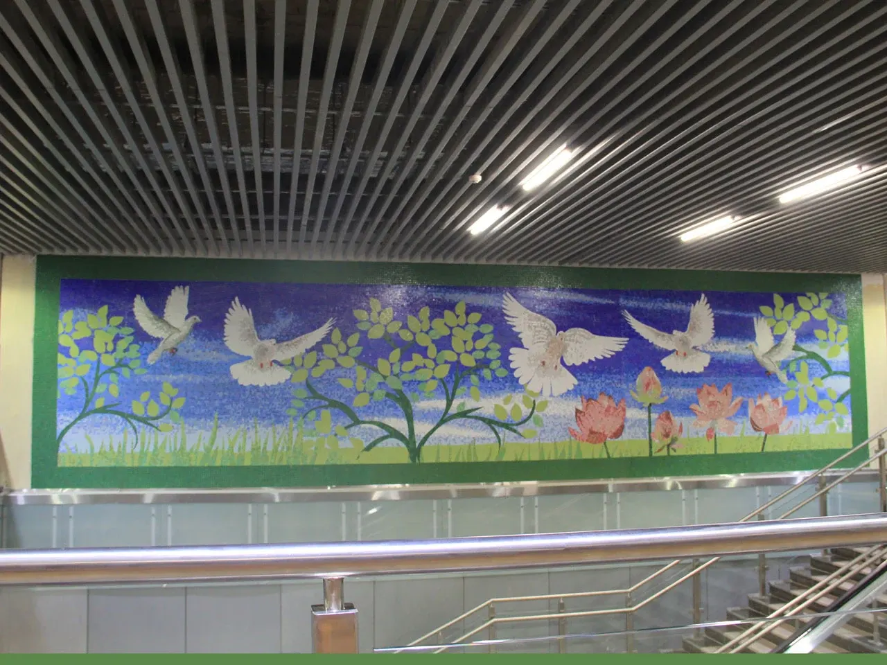 Panchsheel Park metro station mosaic mural of white doves and lotus flowers